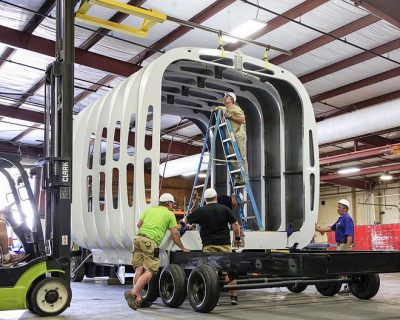 The plastic "ribs" that form the frame of the mobile home were made via 3D printing and additive manufacturing. (Credit: Curbed)